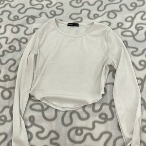 I’m selling this white copped shirt